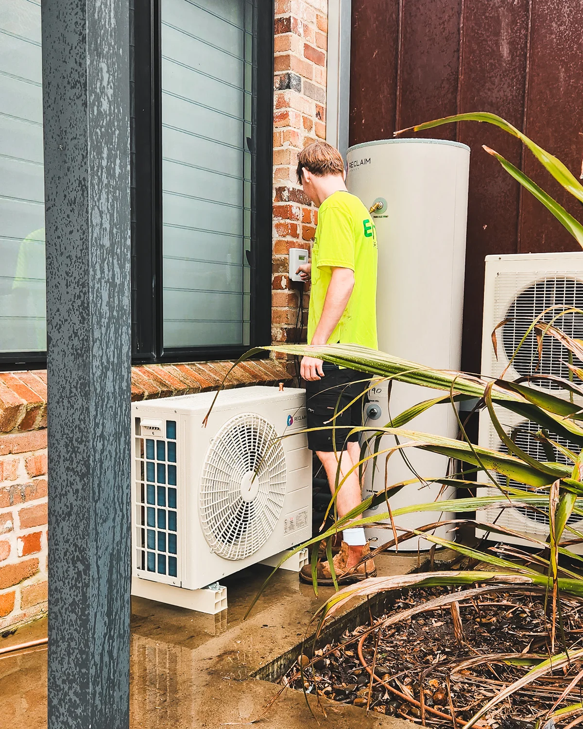 Hot water system installation with heat pump