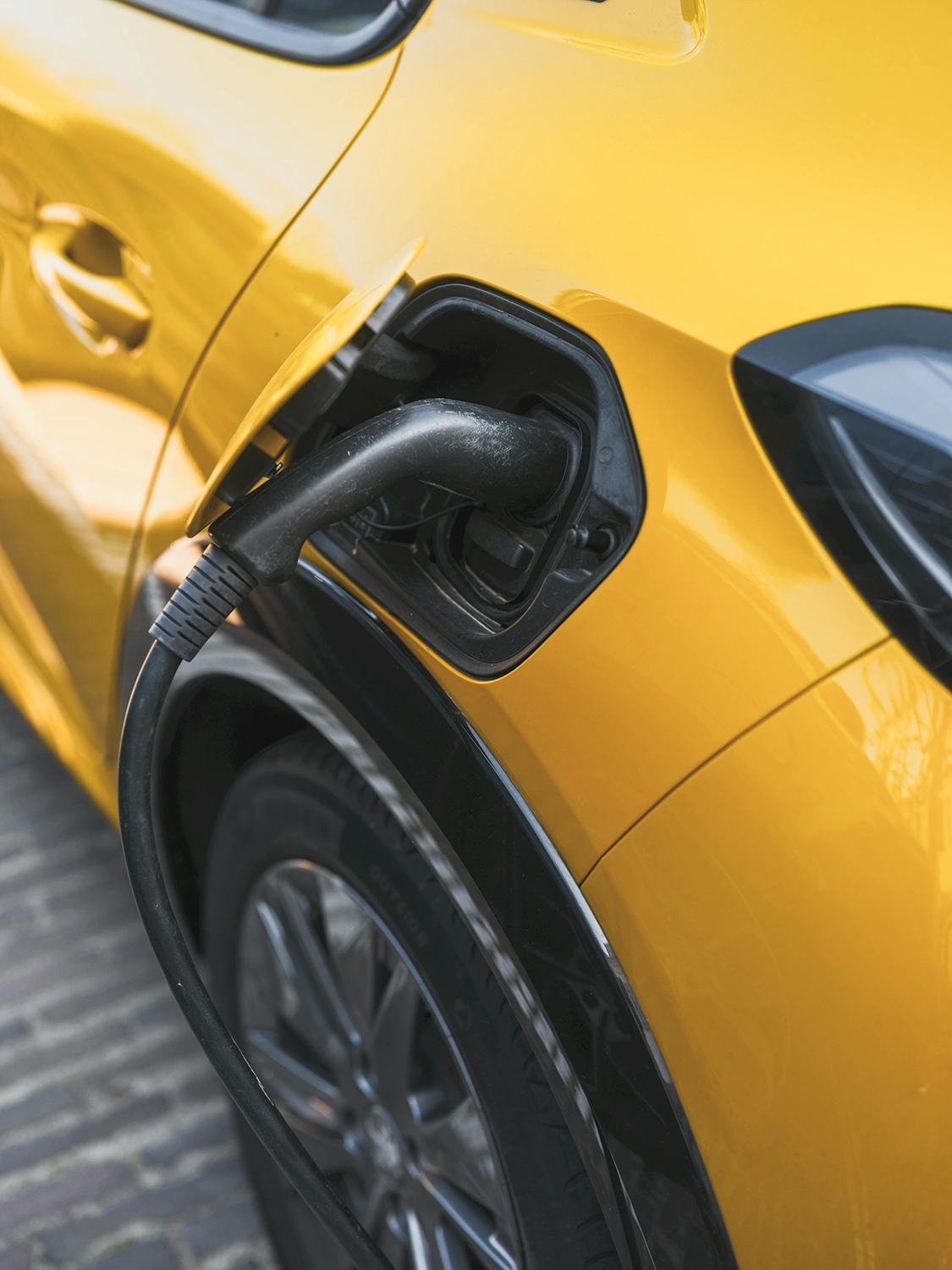 Electric vehicle charging with plug