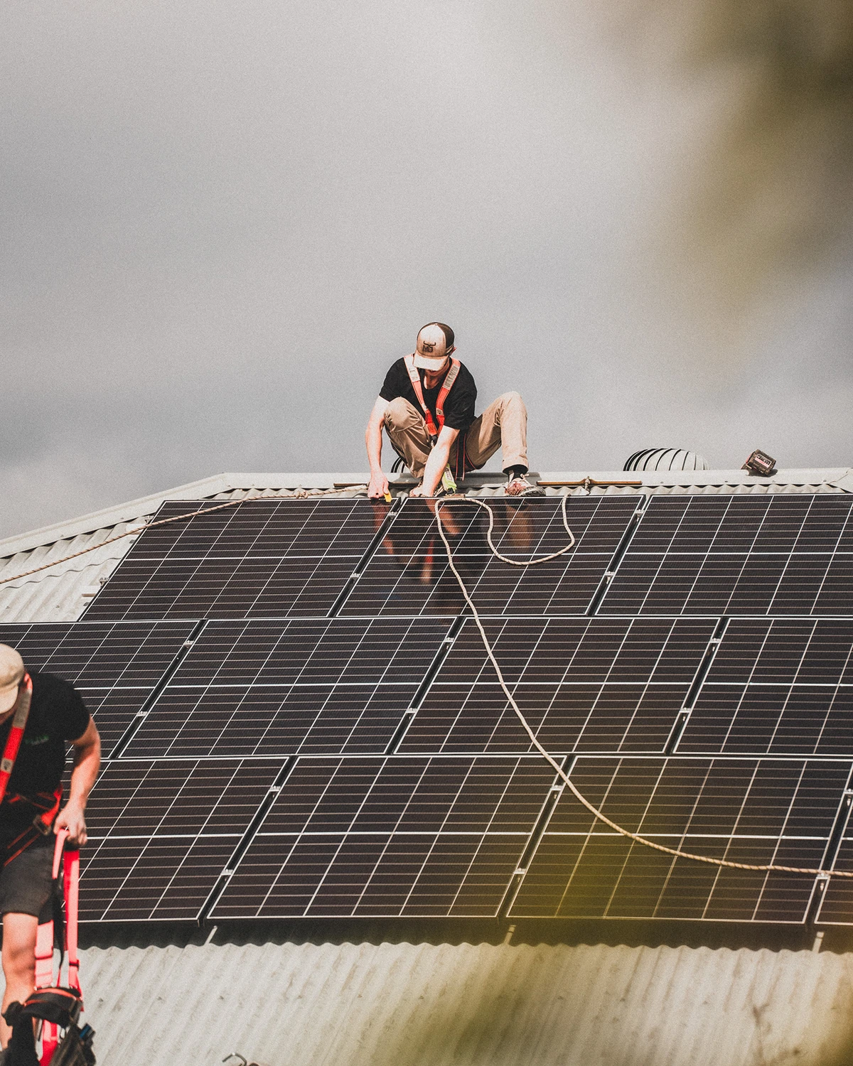Solar installer connecting a solar panel