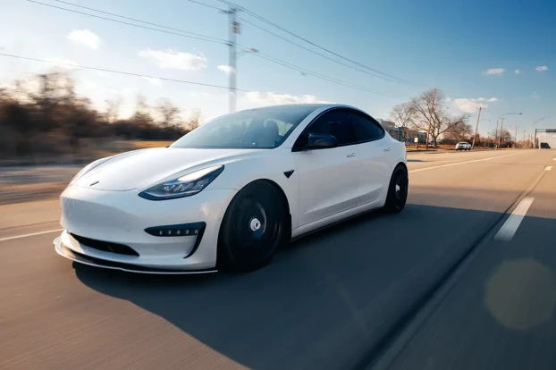 Tesla EV driving